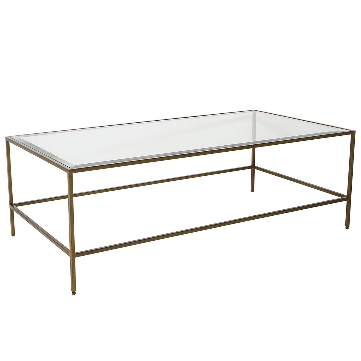 Table basse avec plateau en verre biseauté et piètement en métal bronze