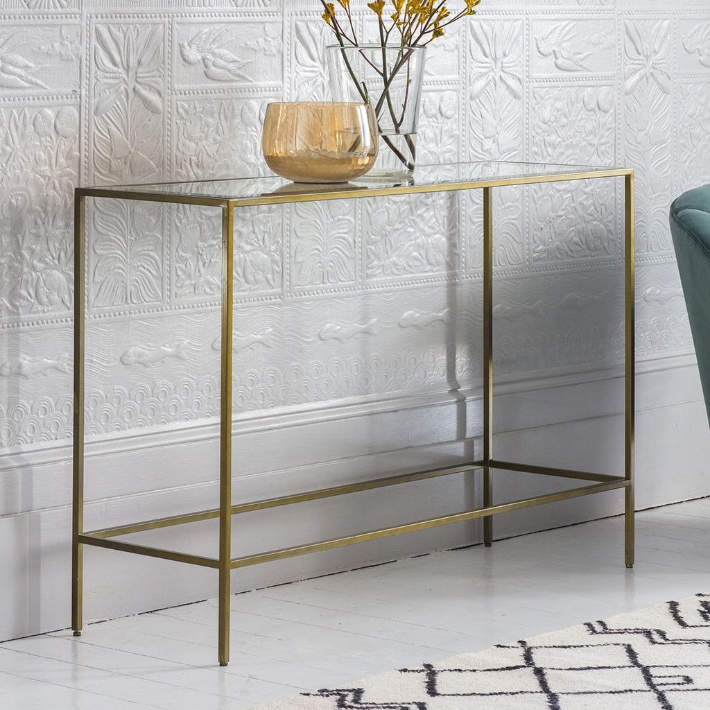Console en métal bronze antique avec plateau en verre biseauté