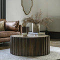 Table basse ronde en travertin avec base cylindrique en bois de manguier