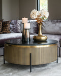 Table basse ronde en marbre et laiton avec piètement en fer