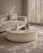 Grande table basse ronde en faux travertin